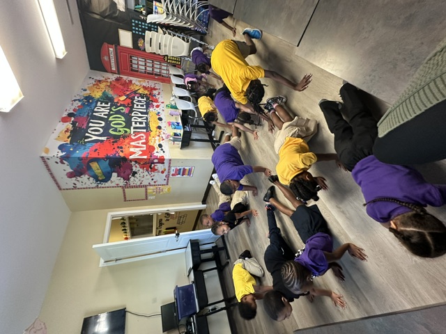 Students Standing in Classroom