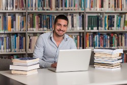 Man Behind a Computer Man Behind a Computer